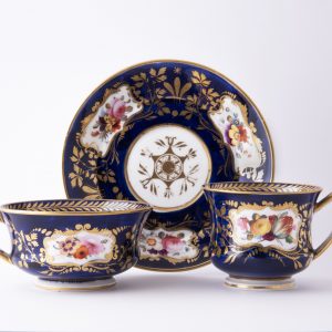 Trio: teacup, coffee cup and saucer