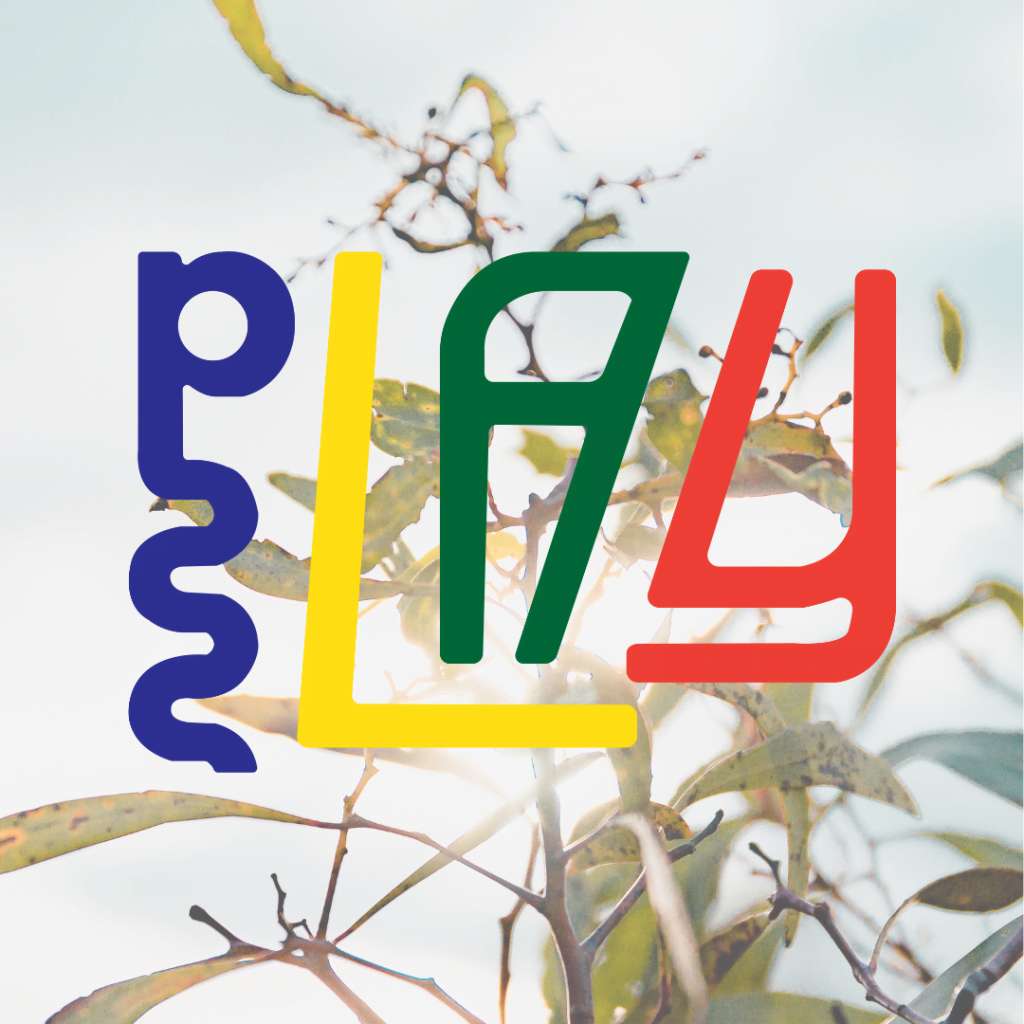 Colourful PLAY logo set against tree foliage and a sunny sky